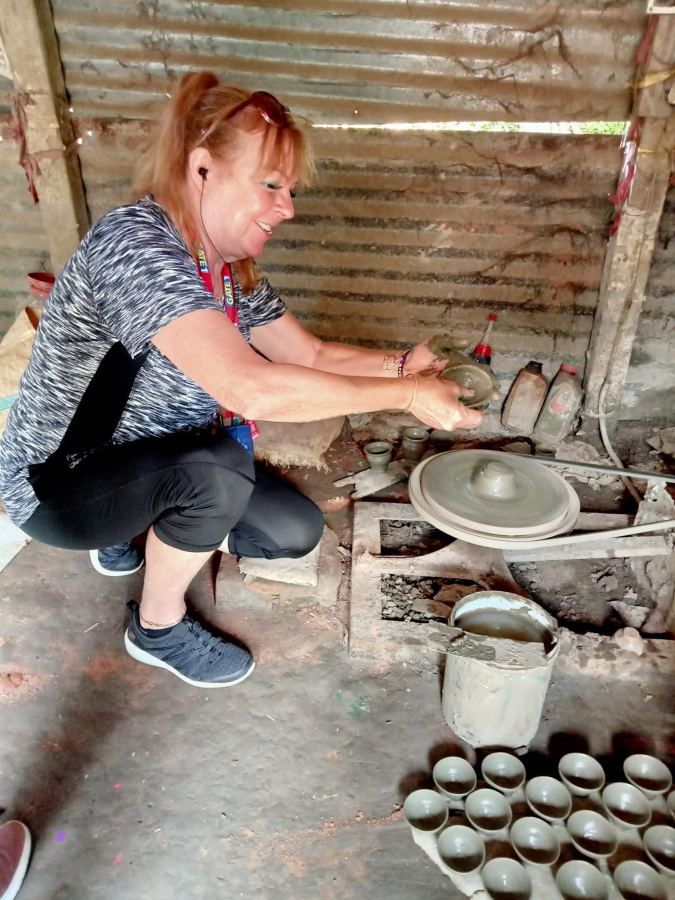 A Traveller Tries the Potter's Wheel
