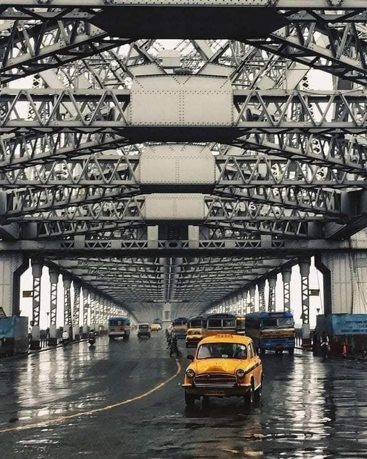 Yellow Taxis on Howrah Bridge