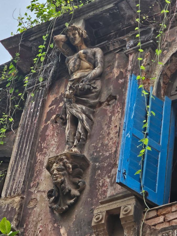 Atlas and the Blue Shutters